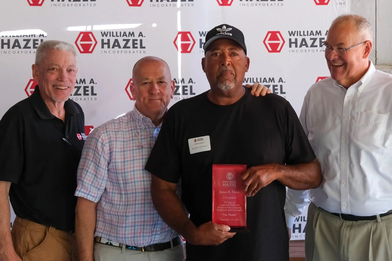 James Payne accepting his 45 Years of Service award with company executives at the Annual Company Picnic for William A Hazel