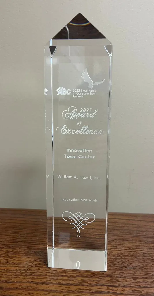 The plaque for one of the 2025 Awards of Excellence won by William A. Hazel site development company